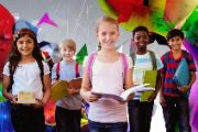  Picture of students holding books wearing bookbags